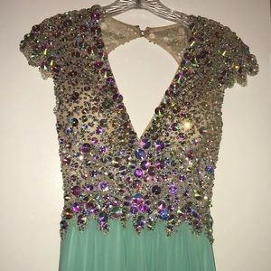Brand new mint prom dress in size 2.
